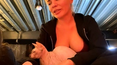 A super sexy blonde with big boobs and masturbating with a v