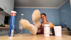 Hot brunette foot fetish play