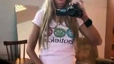 Girl with video camera play her pussy